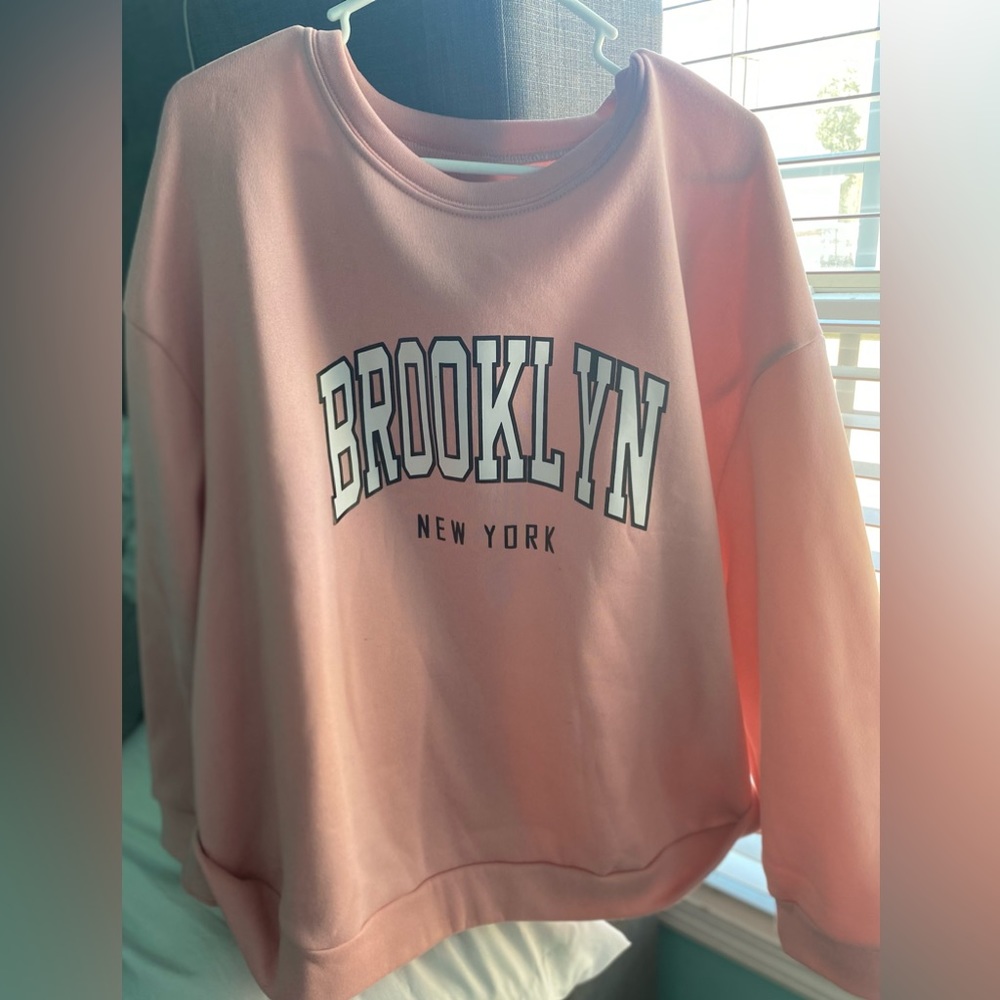 I am selling a Pink Sweatshirt and the size is a 4x